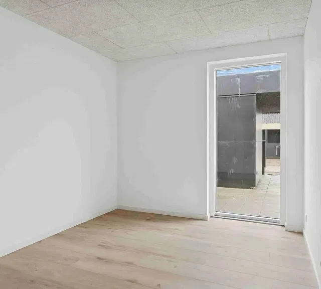 townhouse Moderne étplansrækkehuse med terrasse og carport