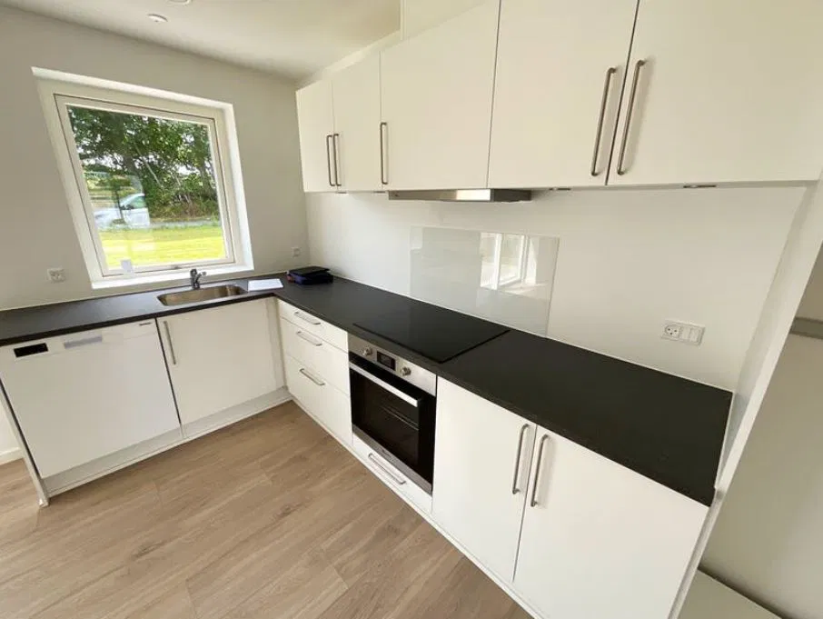 townhouse Lyst rækkehus med tre værelser og egen have i Brenderup