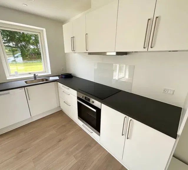 townhouse Lyst rækkehus med tre værelser og egen have i Brenderup