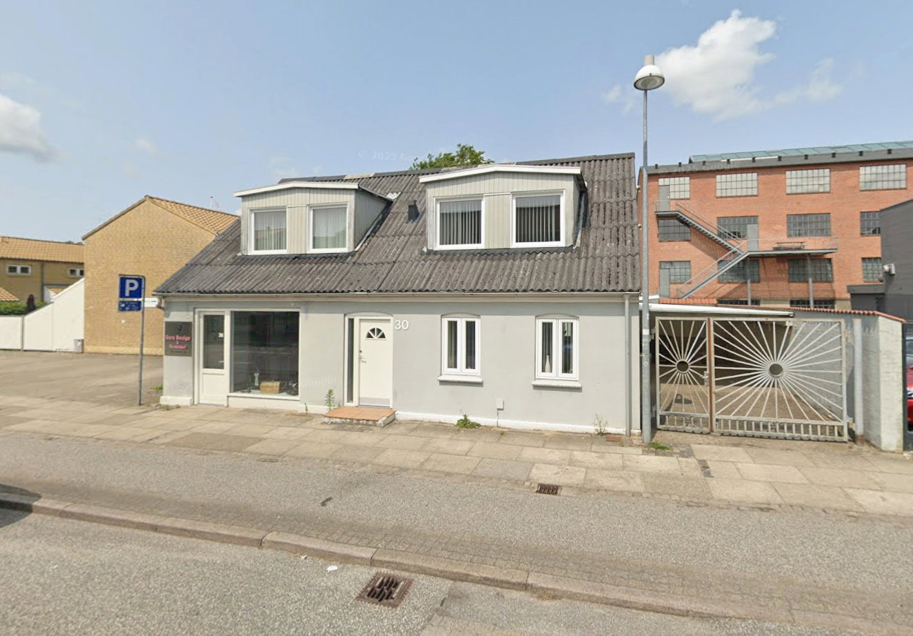 house Centralt byhus med bolig og erhverv i Herning