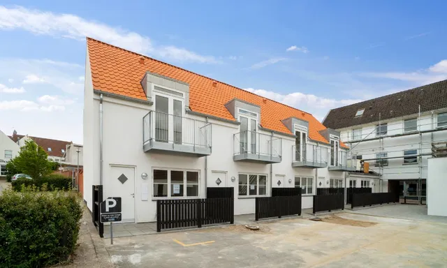apartment Lejlighed med attraktiv central beliggenhed og stort kælderareal