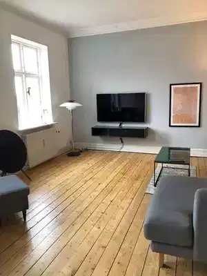 apartment Stor 4-værelses med stuk, franske døre og grøn gårdhave – 126 m2 med central beliggenhed