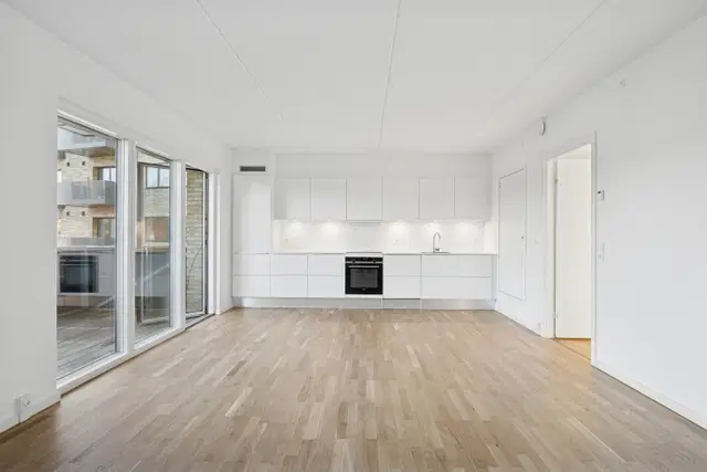 apartment Lys lejlighed i Sorgenfri med grebsløst køkken og altan