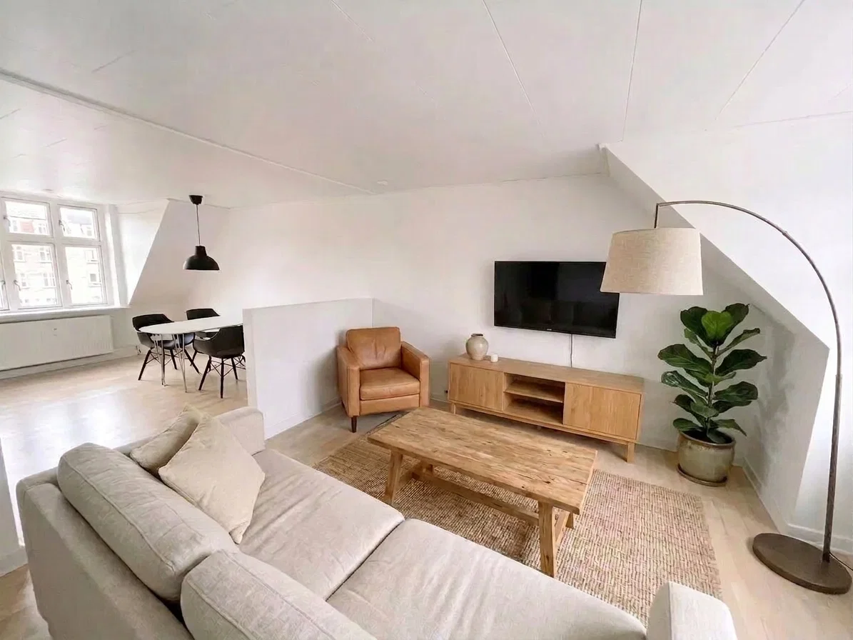 apartment Lys og delevenlig 3-værelses på 90 m2 med skråvægge og grøn fællesgård