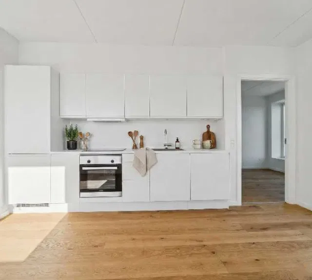 apartment Eksklusiv lofthøjtet penthouse lejlighed med altan