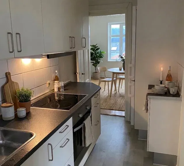 apartment Bright apartment with classic details and a functional kitchen with dishwasher.