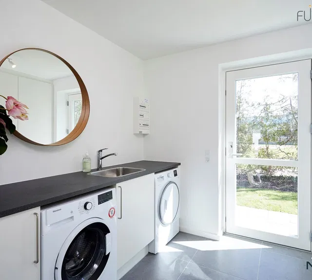 townhouse Moderne gårdhavehus med have, carport og terrasse i Ringsted