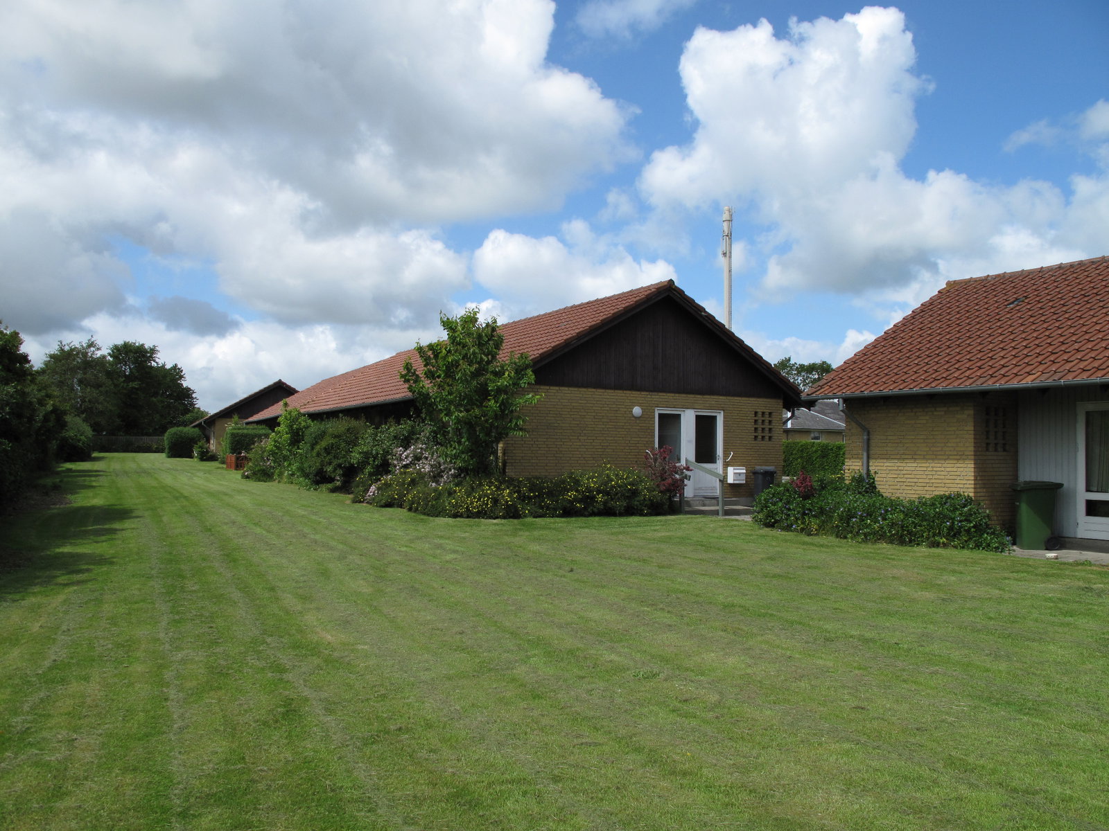 townhouse Rækkehus med solfyldt terrasse, stille villaområde i Esbjerg Ø