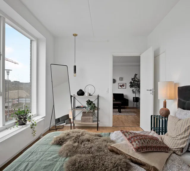 4-værelses bolig med altan mod gården